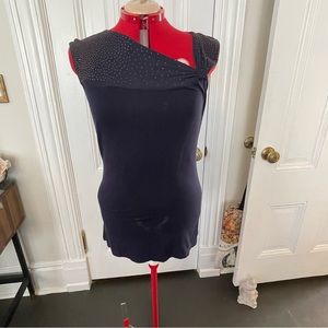 Tank with embellishments.